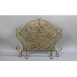 A Gilt Sprayed Wrought Iron Fire Guard, Ornate Form, 88cms Wide