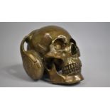 A Modern Heavy Bronze Study of Skull with Headphones, 17cms High