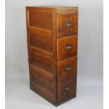 An Edwardian Four Drawer Wooden Filing Cabinet in Two Sections, 40cms Wide by 135cms High by 68cms