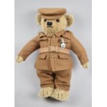 A Merrythought Teddy Bear Dressed in Military Uniform with Medal, 36cms High