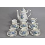 A Royal Albert Forget Me Not Coffee Set comprising Six Coffee Cans, Saucers, Milk Jug, Sugar Bowl,