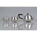 An Art Nouveau Three Piece Silver Tea Service, Birmingham Hallmark having Organical Stylised Handles