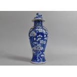A 19th Century Chinese Prunus Pattern Baluster Vase and Cover, Four Character Mark to Base for