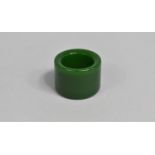 A Green Jade Effect Archers Ring, 2cm wide