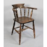 A 19th Century Elm Seated Tub Chair with Turned Spindle Back, H Frame Support on Turned Tapering