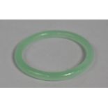 A Jade Effect Bangle, 8cm diameter