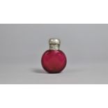 A Silver Top Ruby Faceted Scent Bottle, Birmingham Hallmark 1898 by H.C.F. Complete with Stopper,