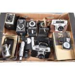 A Collection of Various Vintage Cameras and Photographic Accessories
