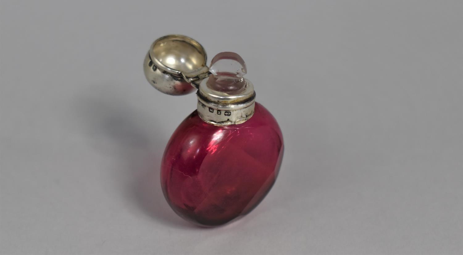 A Silver Top Ruby Faceted Scent Bottle, Birmingham Hallmark 1898 by H.C.F. Complete with Stopper, - Image 3 of 3