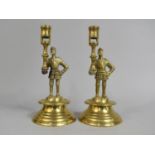 A Pair of Late 19th/Early 20th Century Brass Candlesticks in the Form of Medieval Knights in Armour,