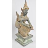 A Patinated and Gilded Bronze Figure of Kneeling Thai Goddess on Rectangular Plinth, 27cms High