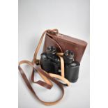 A Pair of Leather Cased Carl Zeiss Jena Jenoptem 8x30 Binoculars