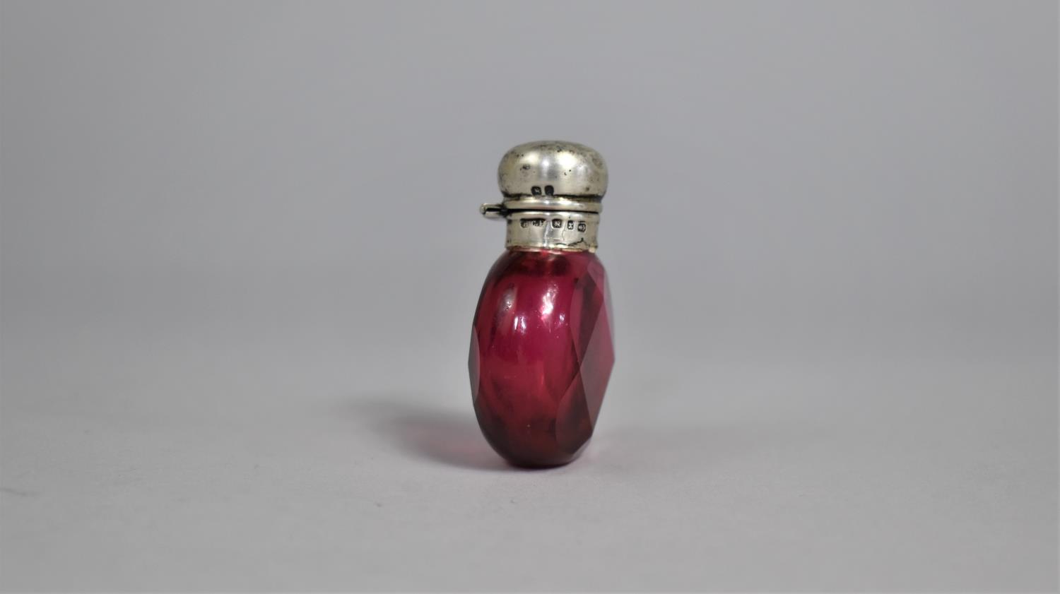 A Silver Top Ruby Faceted Scent Bottle, Birmingham Hallmark 1898 by H.C.F. Complete with Stopper, - Image 2 of 3