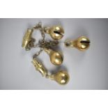 A Collection of Four Brass Sheep or Goat Bells