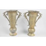 A Pair of Indian Brass Two handled Vases with Engraved Decoration, 24cms High