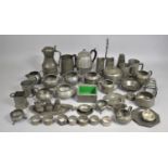 A Collection of Various Hammered Pewter Items to Comprise Tankards, Cruets etc