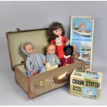 A Vintage Travelling Case containing Various Dolls, Sewing Machine Etc