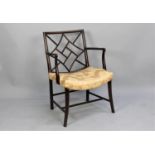 An Aesthetic Movement Anglo Japanesque Mahogany Chair in the Manner of E W Godwin with Stretcher