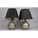 A Pair of Pewter Lamps of Globular Form