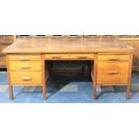 A Mid 20th Century Oak Desk with Two Banks of Drawers and Centre Long Drawer, 180x106x77cm high