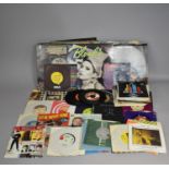 A Collection of Various Singles to include Queen A Kind of Magic, Ghostbusters, Rolling Stones Etc