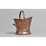 A Late 19th Century Copper Novelty in the Form of a Helmet Shaped Coal Scuttle Stamped S Welch