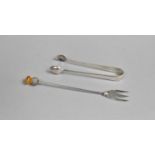 A Silver Sugar Bow and Silver Pickle Fork by Adie and Lovekin, Chester Hallmark for 1927 and 1892