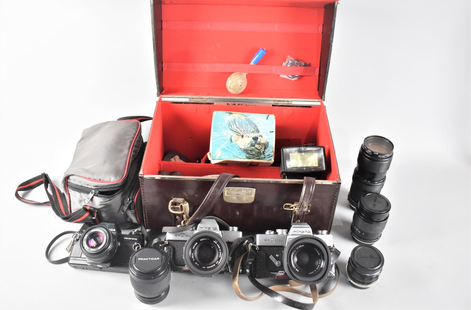 A Collection of Various Cameras to Include Two Minolta SR T 35mm Cameras, Praktica B100 Camera