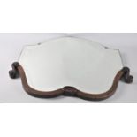 A Mid 20th Century Bevel Edged Wall Mirror of Shaped Form Having Wooden Scrolled Border Having