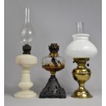 Three Various Oil Lamps to comprise Cast Metal Based Example with Wrythen Glass Reservoir, Base