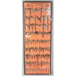 A Wall Hanging Garage Display of Blank Motor Vehicle Keys by Davenport-Burgess