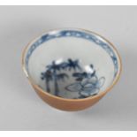 An 18th Century Chinese Porcelain Nanking Cargo Tea Bowl with Inner Blue and White Floral Decoration