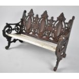 A Modern Dolls Garden Seat in Cast Iron with Wooden Slats, 40cms Wide