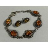 A Silver and Amber Bracelet, 21cm Long Together with Pair of Silver Mounted Amber Earrings