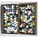 A Vintage Cash Tin Containing Various Sized Marbles