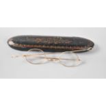 A Pair of Gold Plated Vintage Spectacles in Gilt Decorated Papier Mache Case