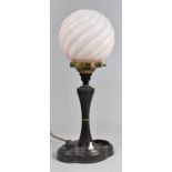 An Early 20th Century Bakelite Combination Table Lamp/Smokers Stand with Opaque Wrythen Globular