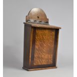 A Crossbanded Oak and Mahogany Wall Hanging Candle Box with Hinged Sloping Lid, 31cms High