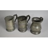 A Collection of Three Pewter Tankards