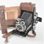 A Vintage Russian Folding Camera, KMZ Moscva 1