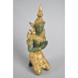 A Green Patinated and Gilt Decorated Bronze Study of Thai Needling Goddess, 17cms High