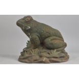 A Large Cast Iron Doorstop in the Form of a Seated Frog, 25cms High