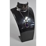 A Silver Mounted Amethyst Pendant on Silver Chain, 80cm Long Together with a Pair of Silver