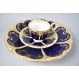 A Victorian Porcelain Cobalt Blue, Cream and Gilt Trio Comprising Cup, Saucer and Dish, all