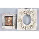 A 19th Century Continental Creamware Photo frame with Relief Floral Decoration together with a