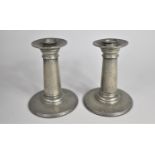 A Pair of Hand Beaten Tudric Pewter Candlesticks with Removable Caps, As Made for Liberty and Co, No