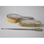 Three Various Silver Mounted Dressing Table Items, Two Brushes and a Button Hook
