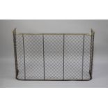 A Late Victorian/Edwardian Brass Mounted Wire Fire Guard, 106cm wide