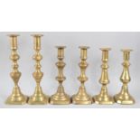 Three Pairs of Victorian Brass Candlesticks with Pushers, the Tallest 27cm
