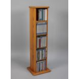 A Modern Pine CD Rack Containing Classical CD's